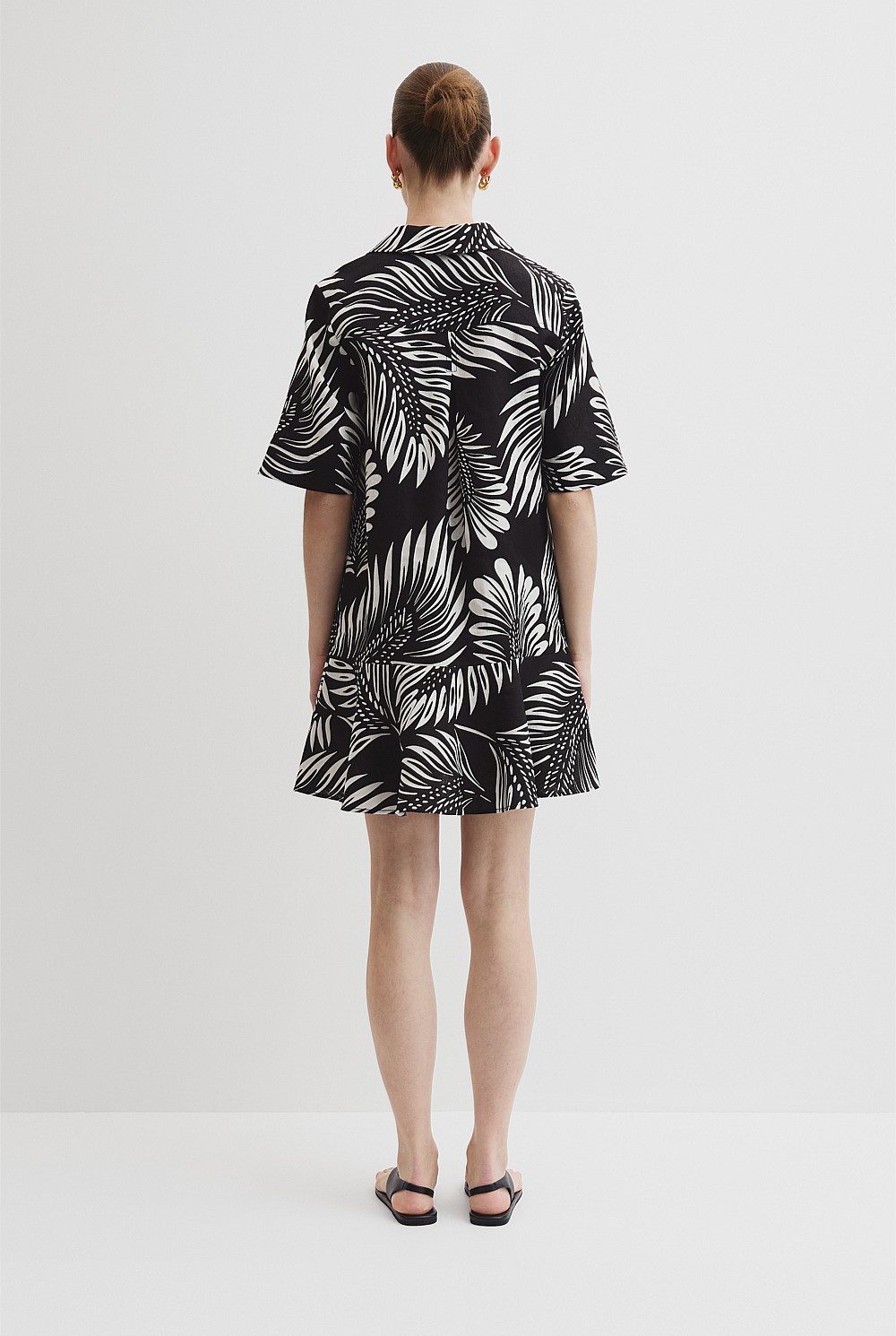 Black Feather Palm Print Linen Popover Dress - Holiday | Country Road Black Feather Palm Print Linen Popover Dress - Holiday | Country Road